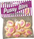 Sweet gummy candies shaped like letters, pink and pale yellow, in a clear bag