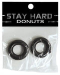 2-pack of black donut-shaped rings in clear plastic bag