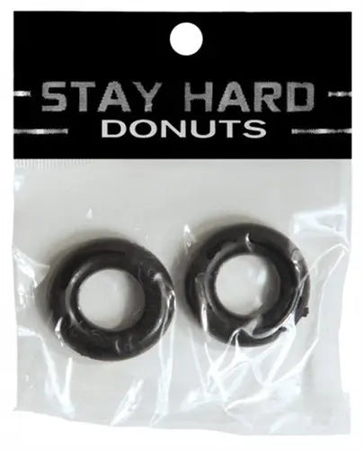 2-pack of black donut-shaped rings in clear plastic bag