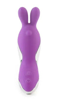 Purple bunny-shaped toy figure with long ears and tapered body