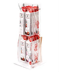 Assorted lip balm tube tower display with clear packaging, multiple X-branded tubes