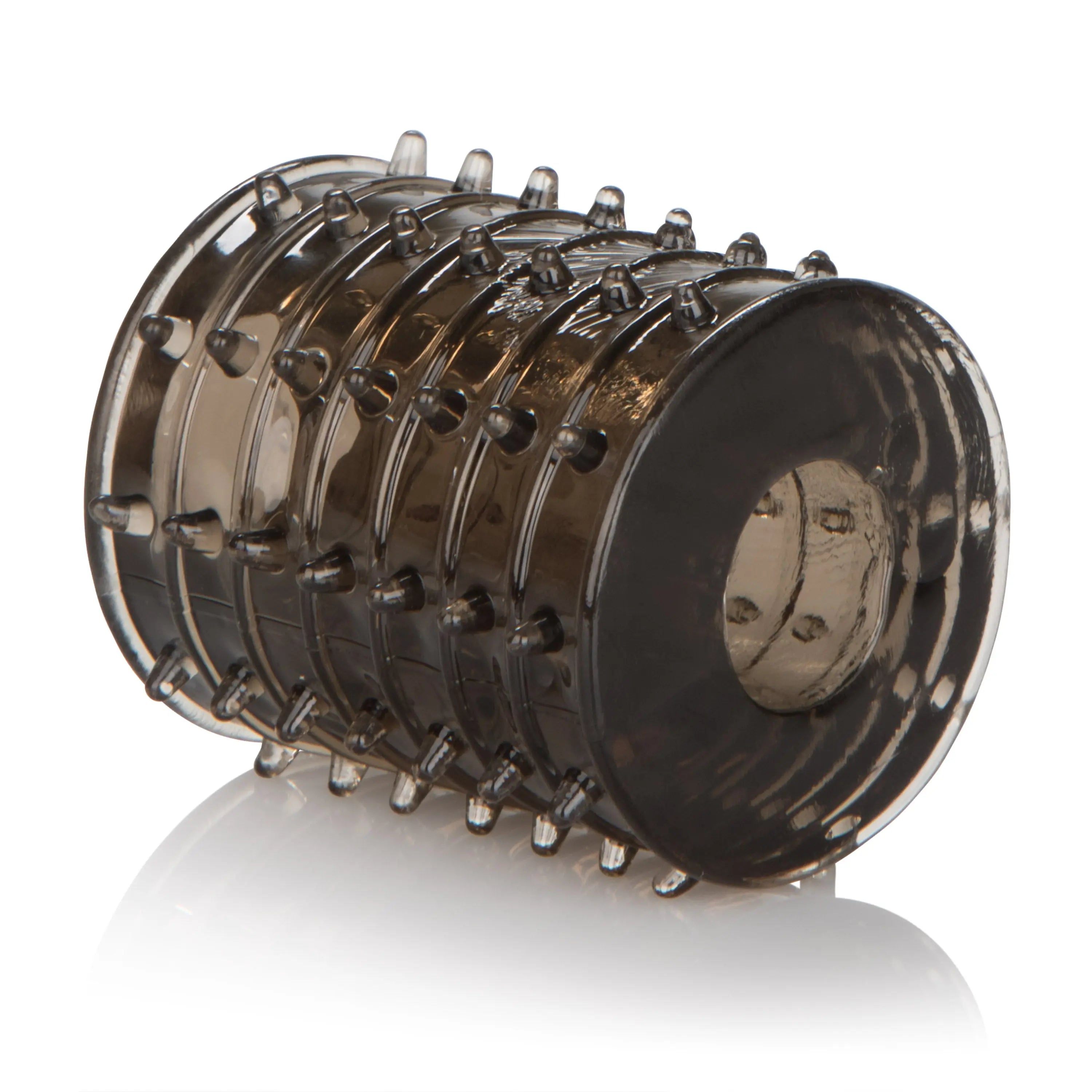 Silicone girth ring with molded spikes and black outer rim, glossy.
