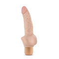 Beige silicone dildo with rounded tip and flared base