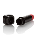 Hide and Play lipstick in red, with black cap open and exposed tube