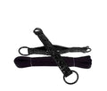 Black bed restraint straps with ring and braided fabric loop attachments