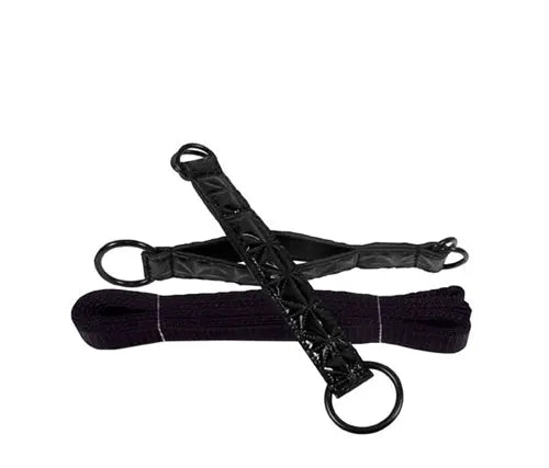 Black bed restraint straps with ring and braided fabric loop attachments