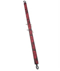 Red patterned spreader bar with metal end loops