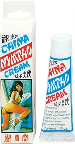 Cream bottle, white container with blue label and red lettering; 1.2 oz