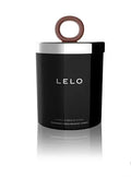 Massage candle in black jar with copper ring handle and Lelo logo