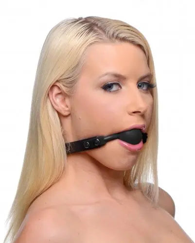Silicone locking ball gag with black strap and magenta ball