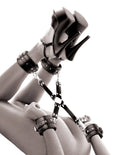 Black leather-style hogtie restraint set with thigh harness, leg cuffs.