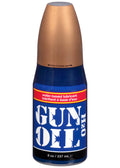 8 oz gun oil bottle with blue label and red stripe