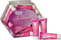 Fishbowl with pink aphrodisiac tubes and white caps