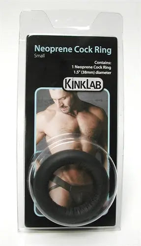 Small thick neoprene cock ring, dark black, shown in retail packaging