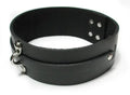 Black leather bondage collar with metal rings and round stud accents