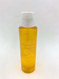 Lotion bottle in amber yellow with white cap, Pina Colada label