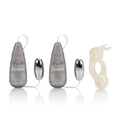 Rabbit-shaped sex toy accessory with two gray control units and chrome oval ports