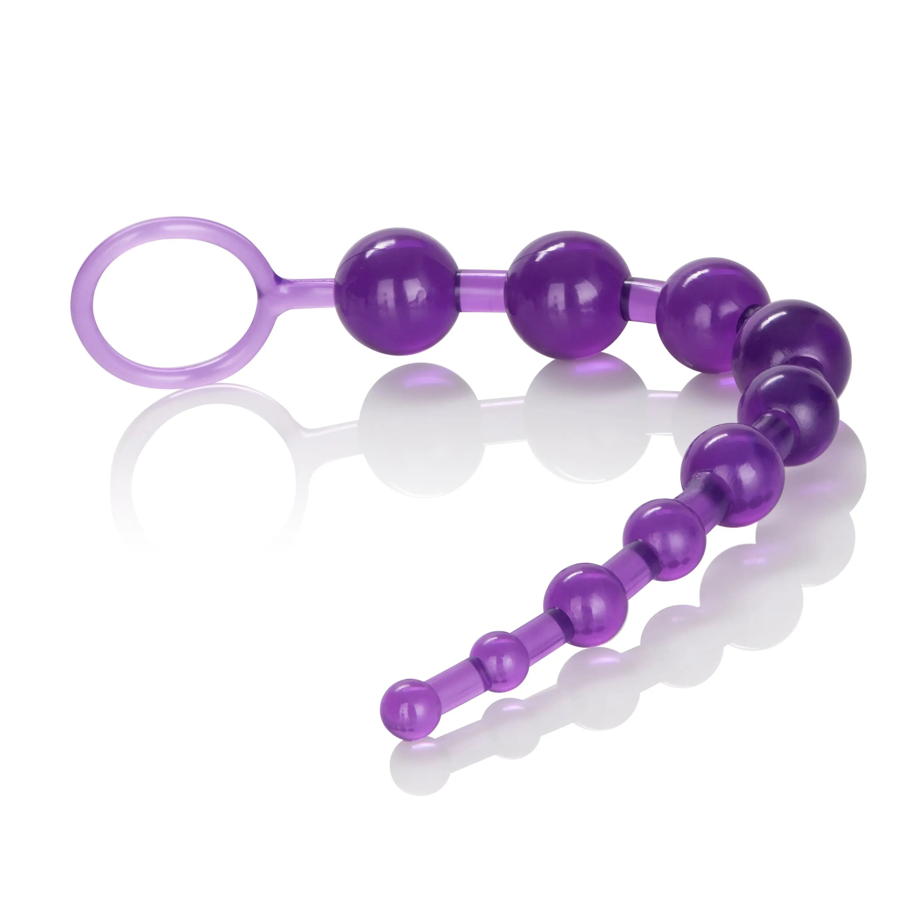 Purple beaded toy with ring handle
