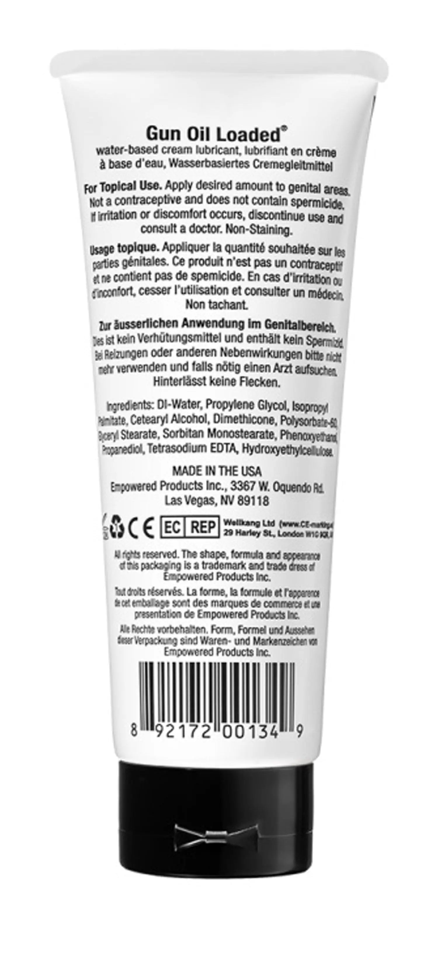 Gun oil tube with black cap, white label and barcode